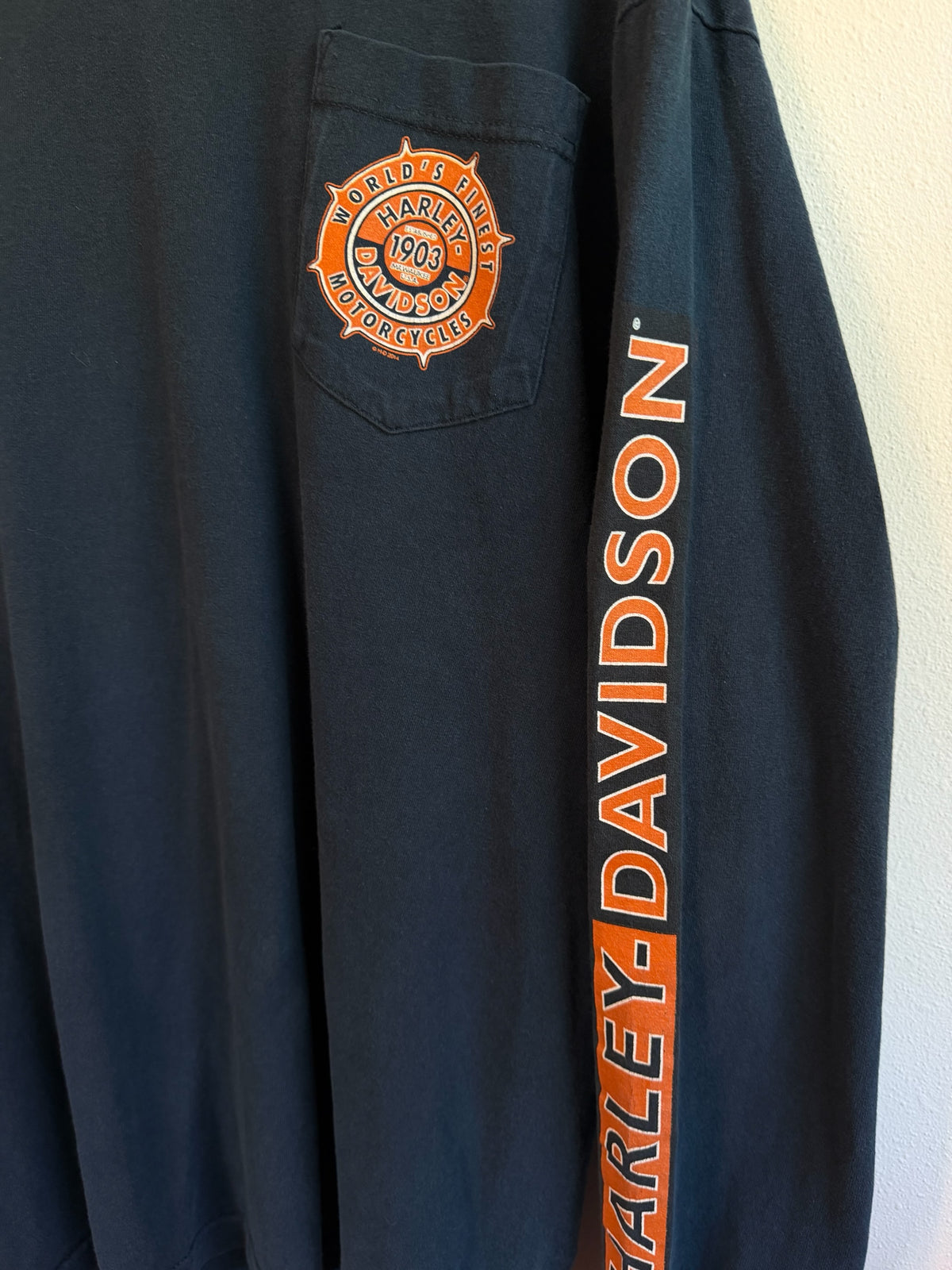 225 Threadz black long sleeve Harley-Davidson t-shirt featuring a chest pocket logo and sleeve lettering
