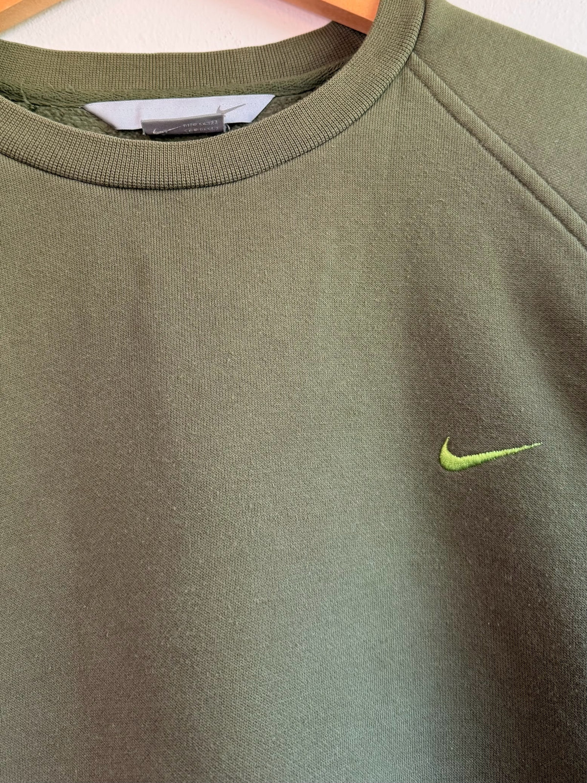225 Threadz olive green Nike crewneck sweatshirt with raglan sleeves and an embroidered lime green Swoosh logo