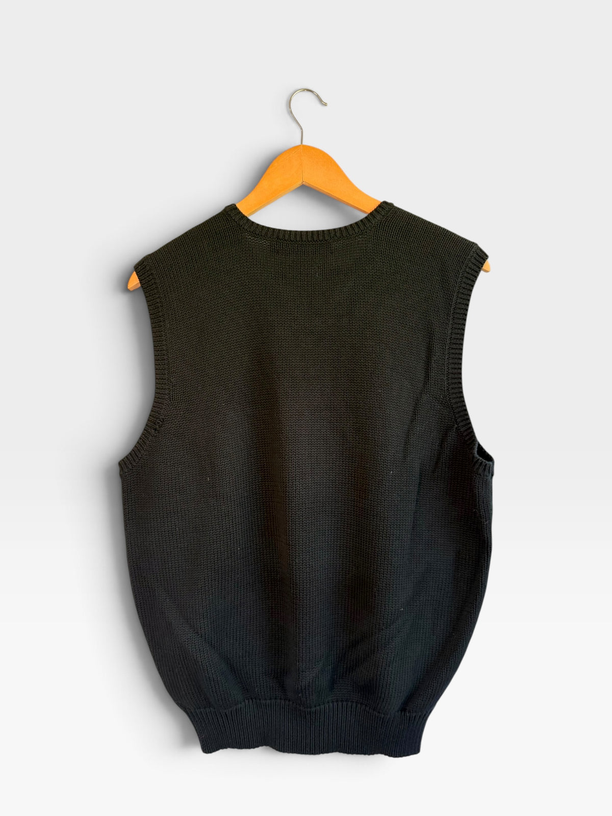 225 Threadz black Polo Ralph Lauren V-neck knit sweater vest on a wooden hanger against a plain background