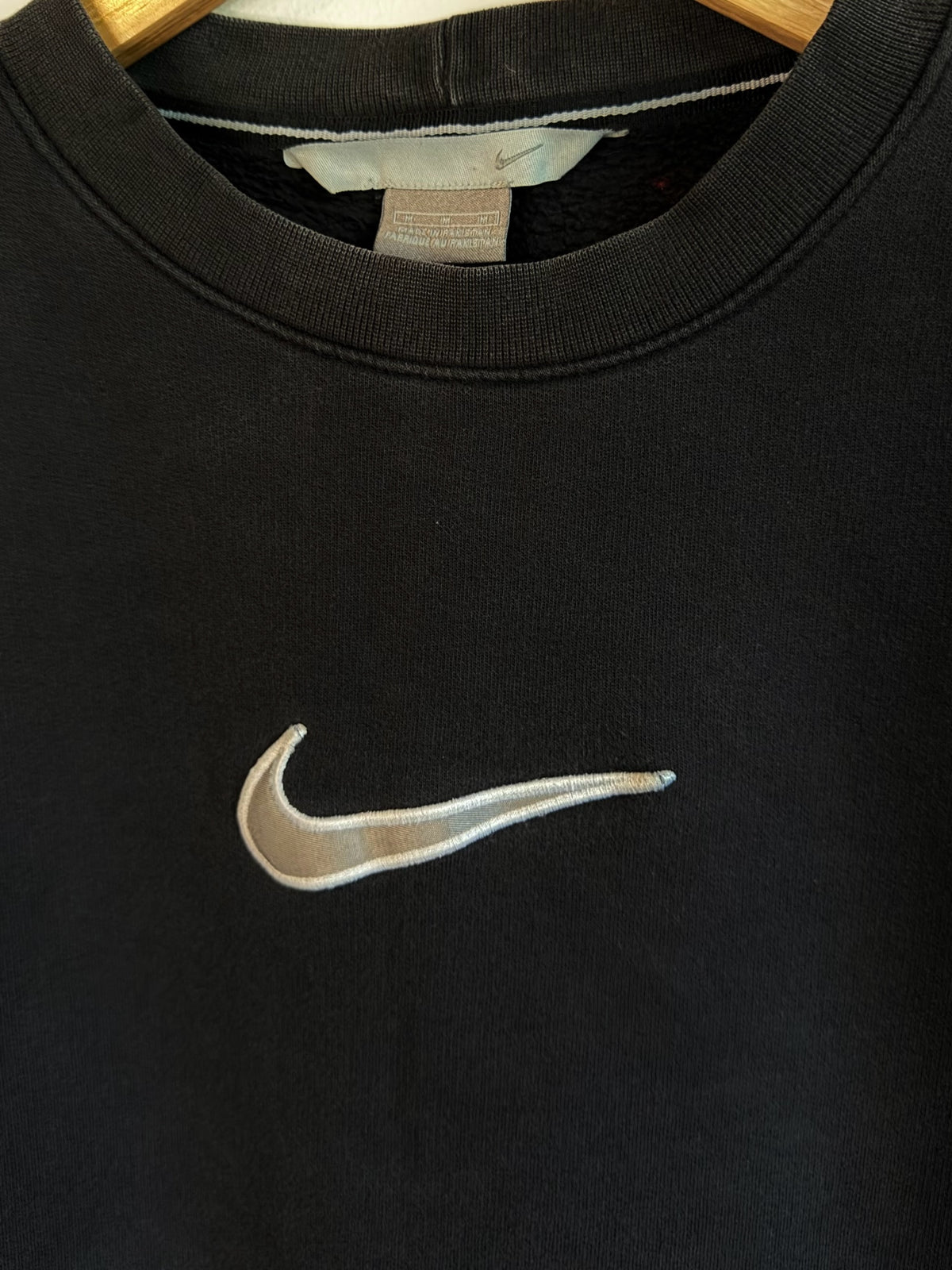 225 Threadz black Nike crewneck sweatshirt featuring a center-chest embroidered white Swoosh logo