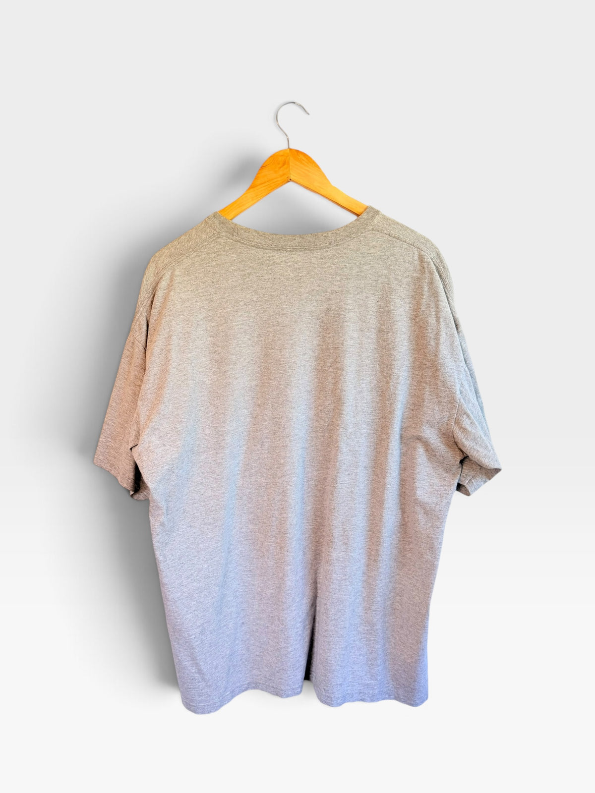 Back view of a 225 Threadz heathered grey cotton-blend crewneck t-shirt hanging on a wooden hanger.