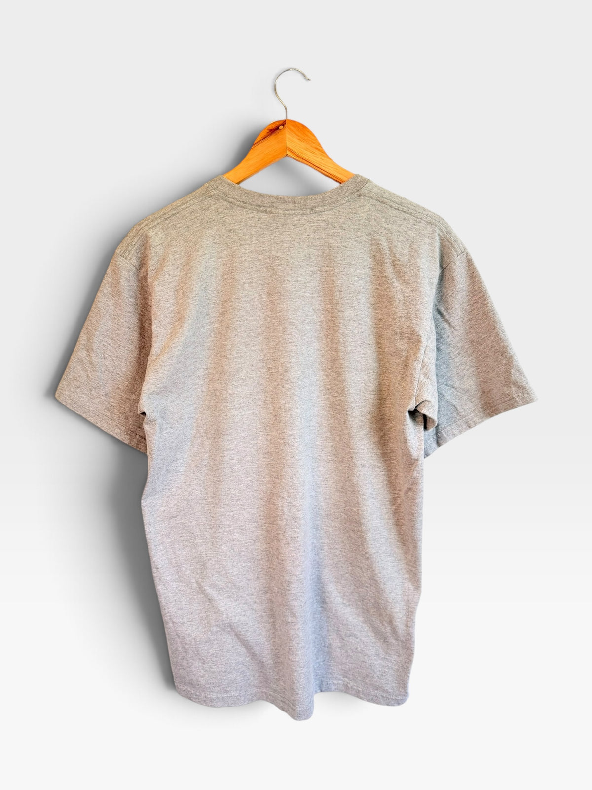 225 Threadz grey heather short sleeve crew neck t-shirt hanging on a wooden hanger, back view.