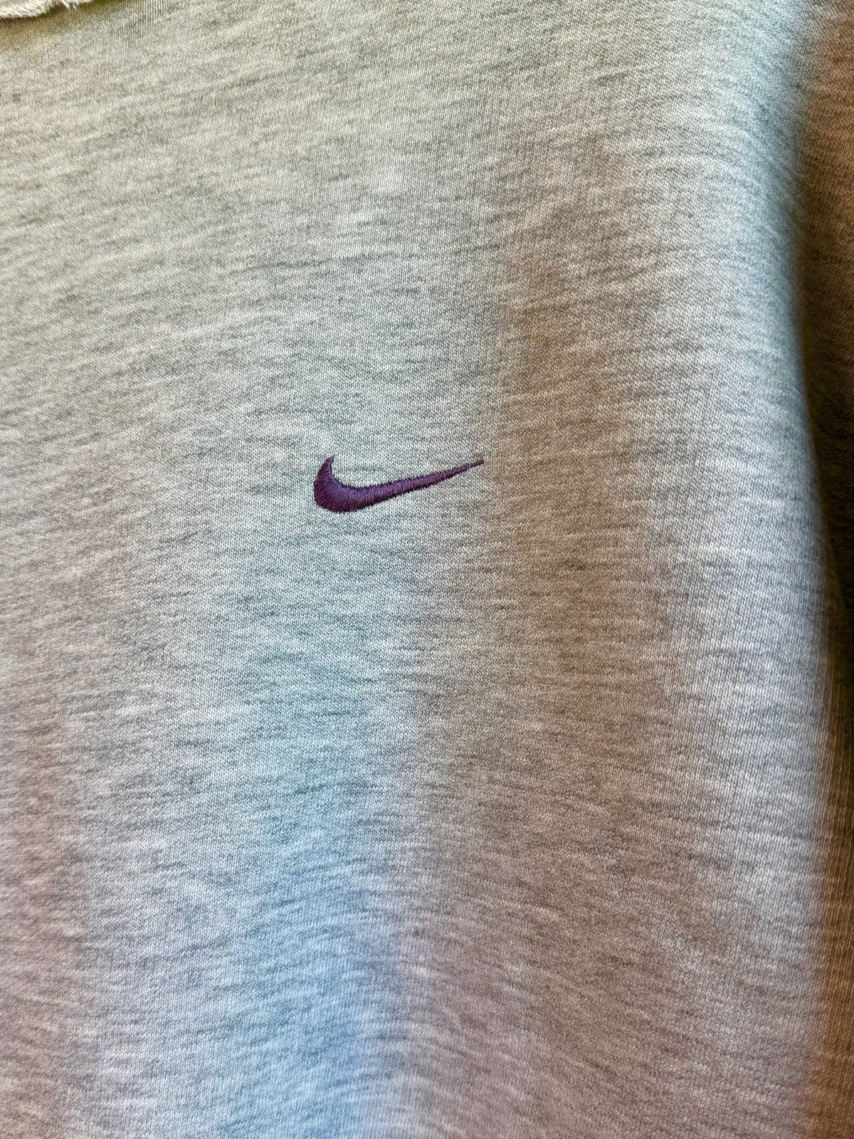 225 Threadz grey Nike long sleeve crewneck sweatshirt with a small purple embroidered swoosh logo on the chest