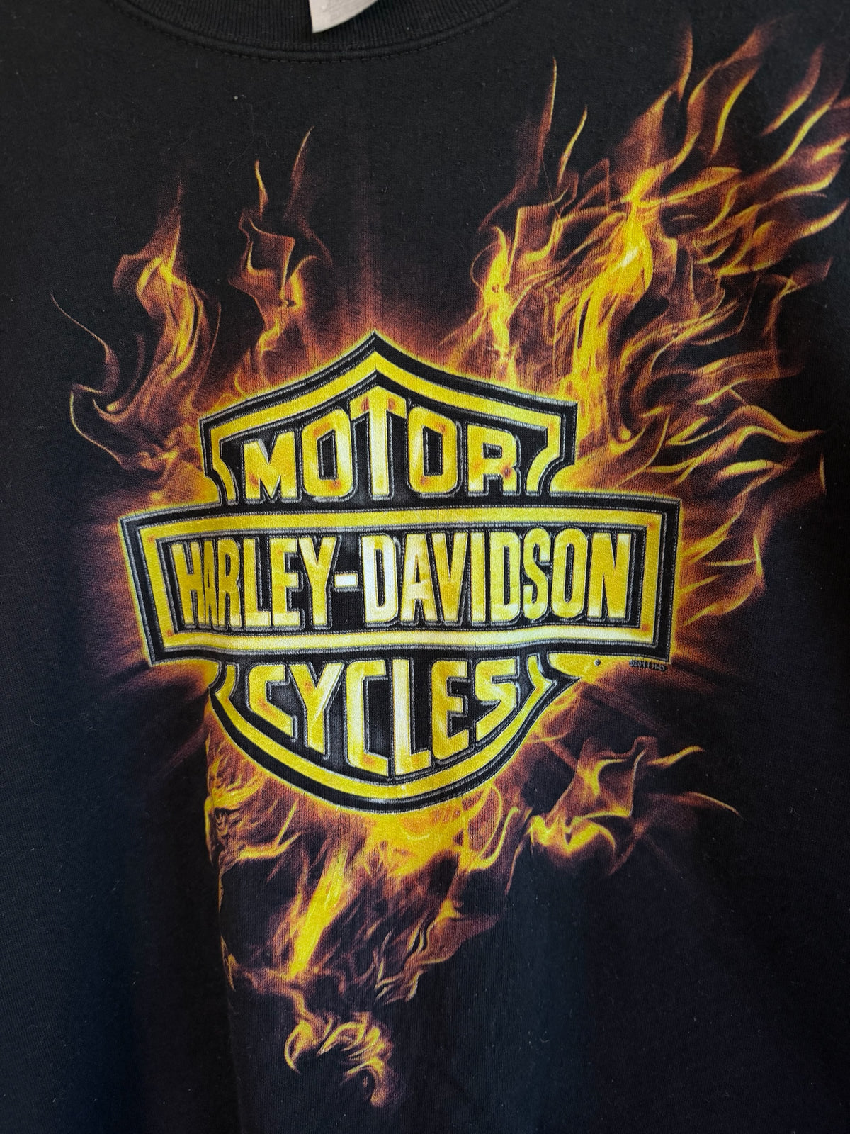 225 Threadz black Harley-Davidson crewneck sweatshirt featuring a bold Bar and Shield logo with vibrant orange flames