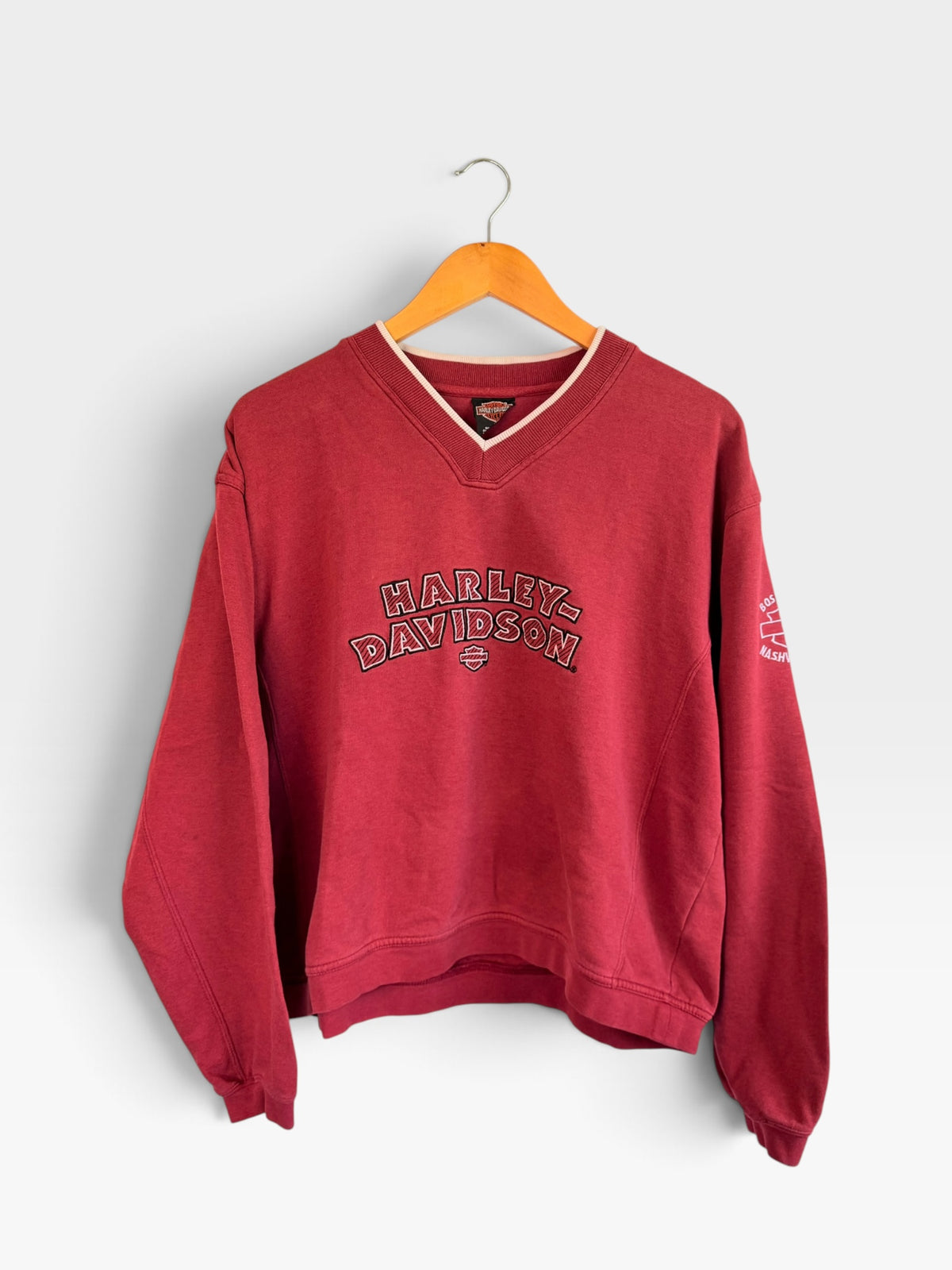 225 Threadz vintage deep red Harley-Davidson V-neck pullover sweatshirt with embroidered chest logo on a hanger