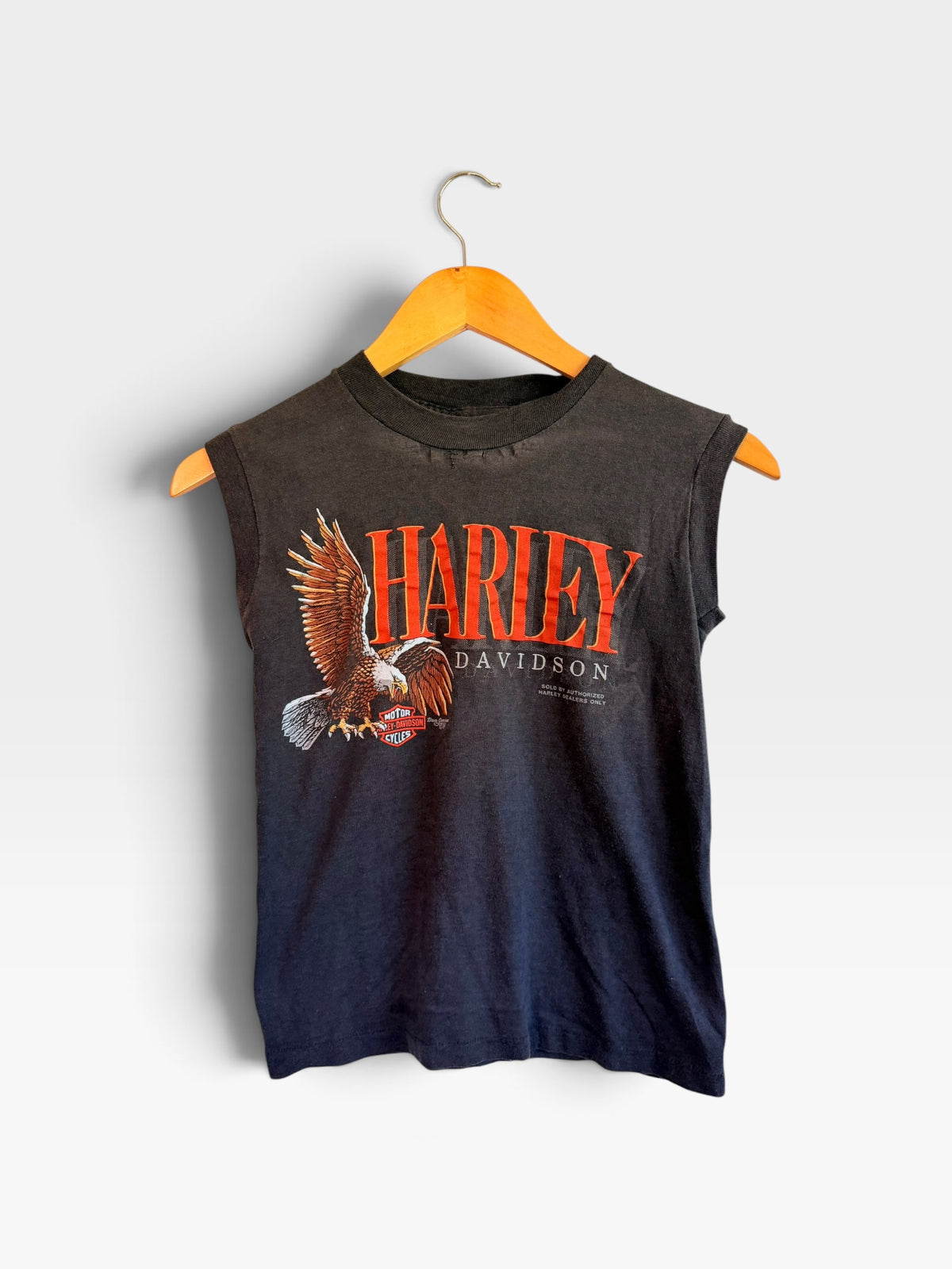 225 Threadz vintage Harley-Davidson sleeveless black cotton muscle tee with eagle graphic and orange lettering