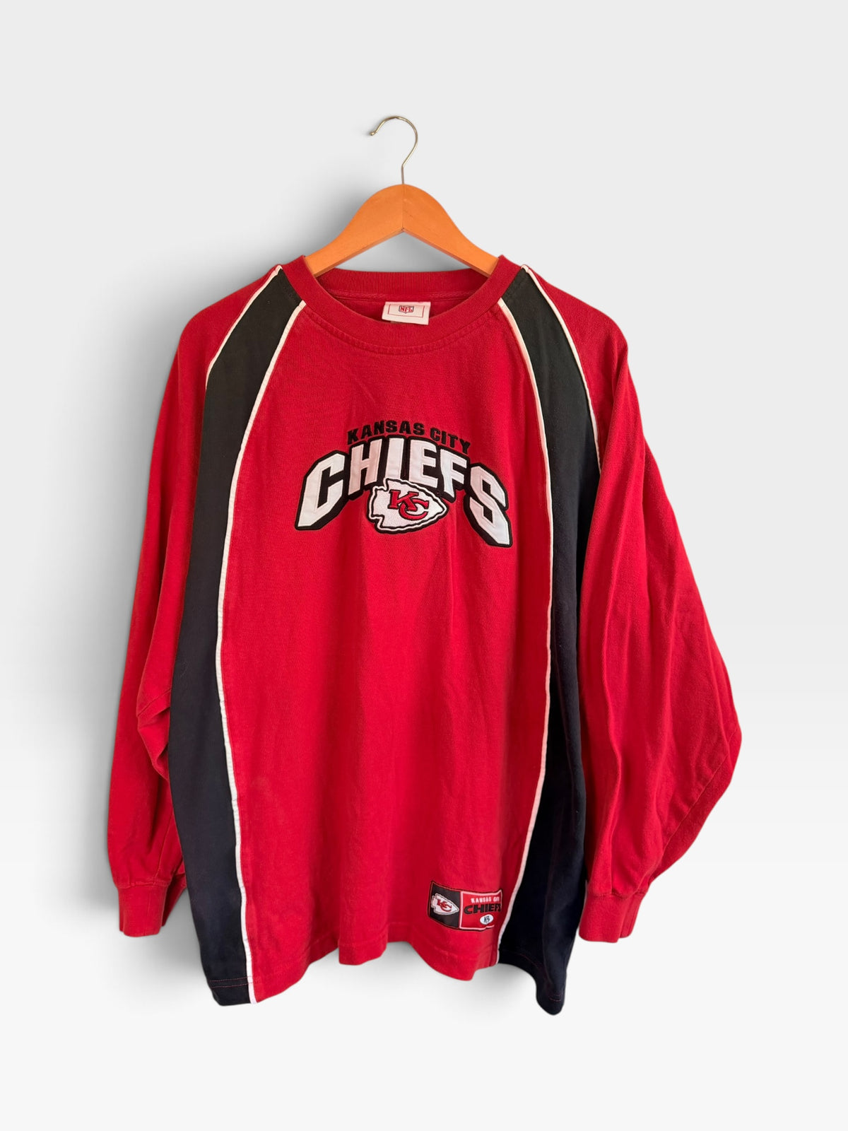 225 Threadz Kansas City Chiefs red long-sleeve jersey with black side panels, white piping, and team logo on chest.
