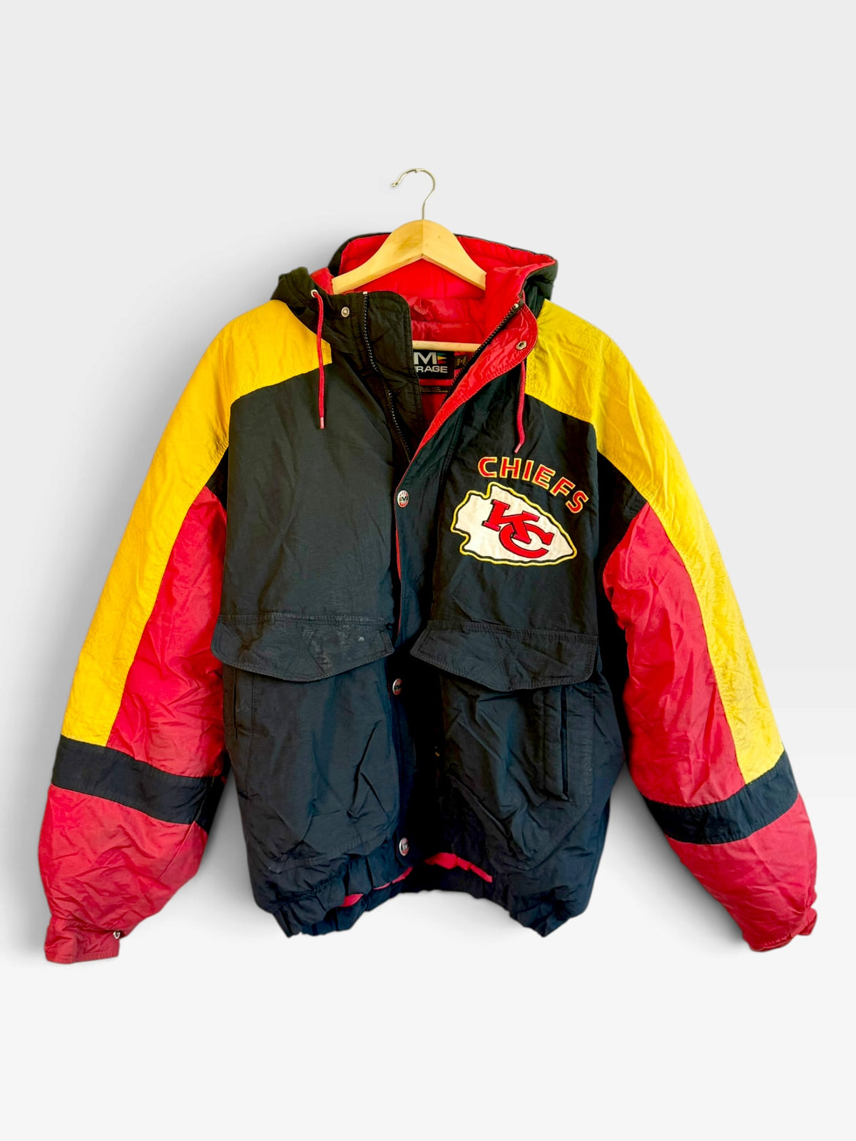 225 Threadz vintage Kansas City Chiefs puffer jacket in black, red, and yellow with embroidered logo and hood