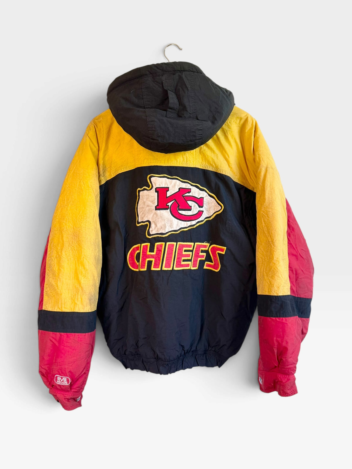 225 Threadz vintage Kansas City Chiefs puffer jacket with black, yellow, and red color-blocked nylon and back logo