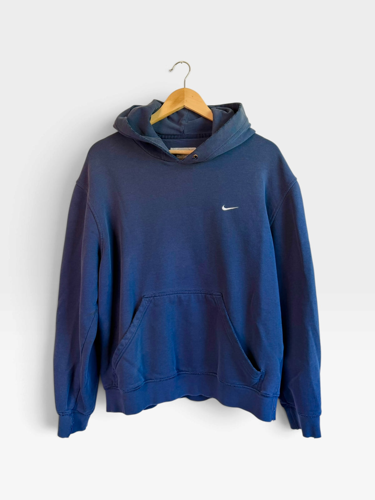 225 Threadz navy blue Nike pullover fleece hoodie with a front kangaroo pocket and embroidered swoosh logo on chest