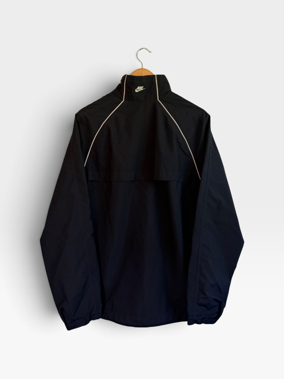 225 Threadz black Nike windbreaker jacket with white piping on raglan sleeves and embroidered logo on back collar