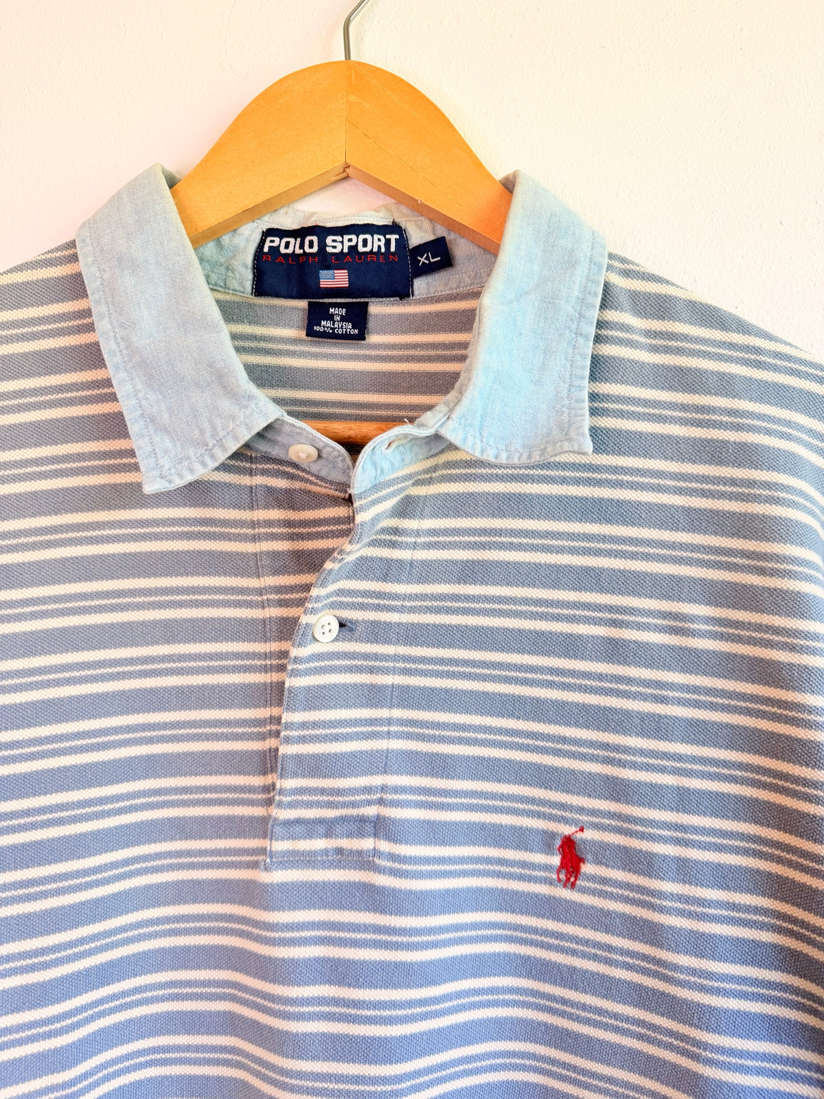 225 Threadz Polo Sport Ralph Lauren light blue and white striped cotton polo shirt with red pony logo on hanger
