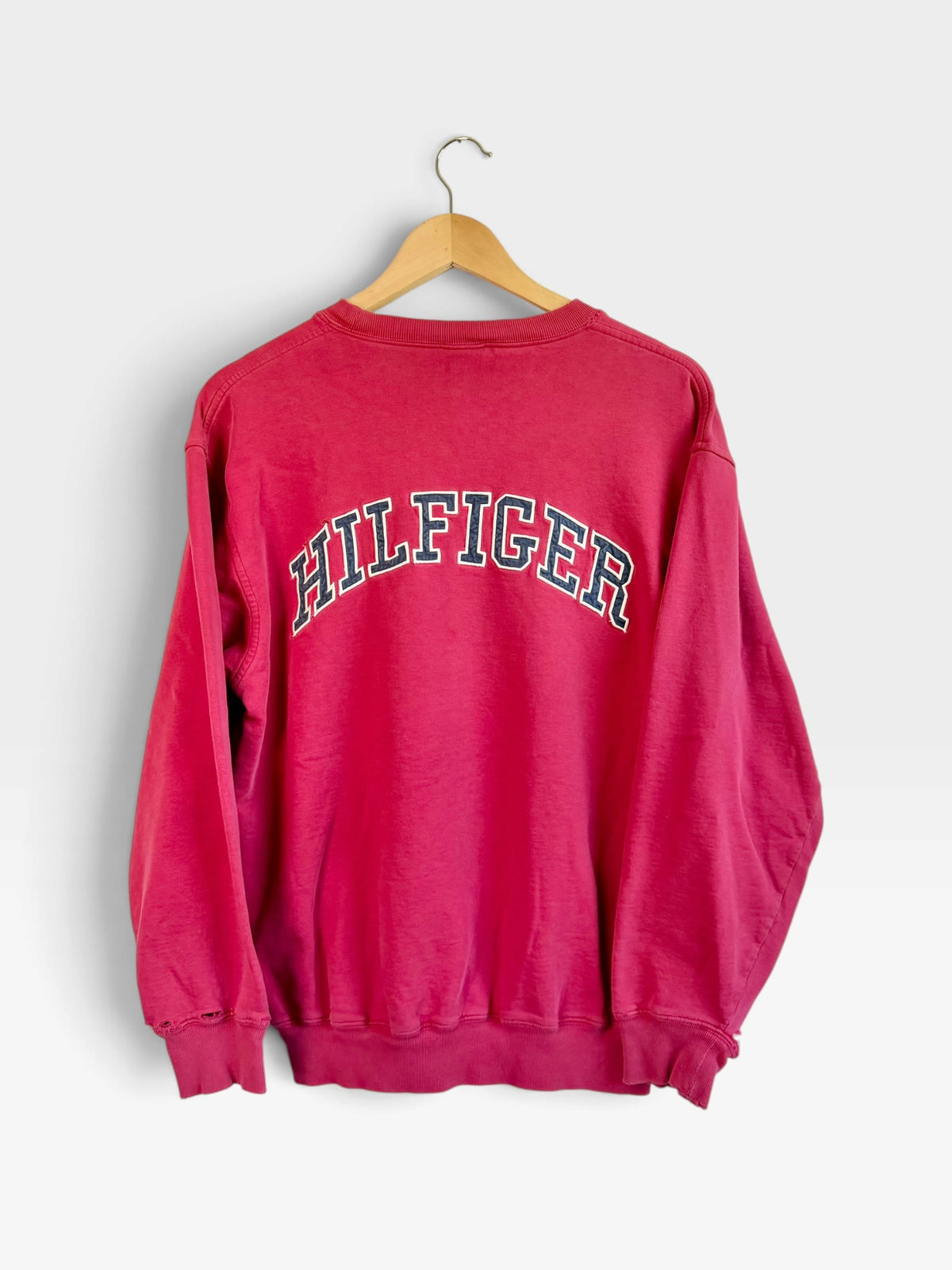 225 Threadz vintage red Tommy Hilfiger crewneck sweatshirt with arched Hilfiger lettering on the back