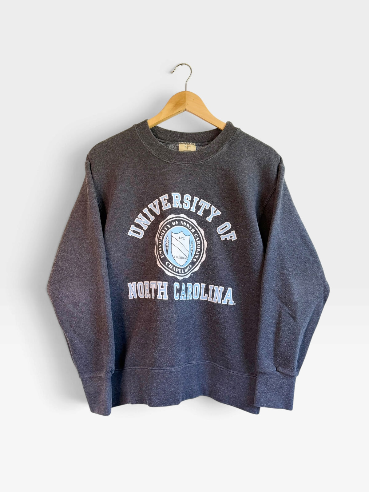 225 Threadz charcoal grey University of North Carolina crewneck sweatshirt with light blue and white university seal