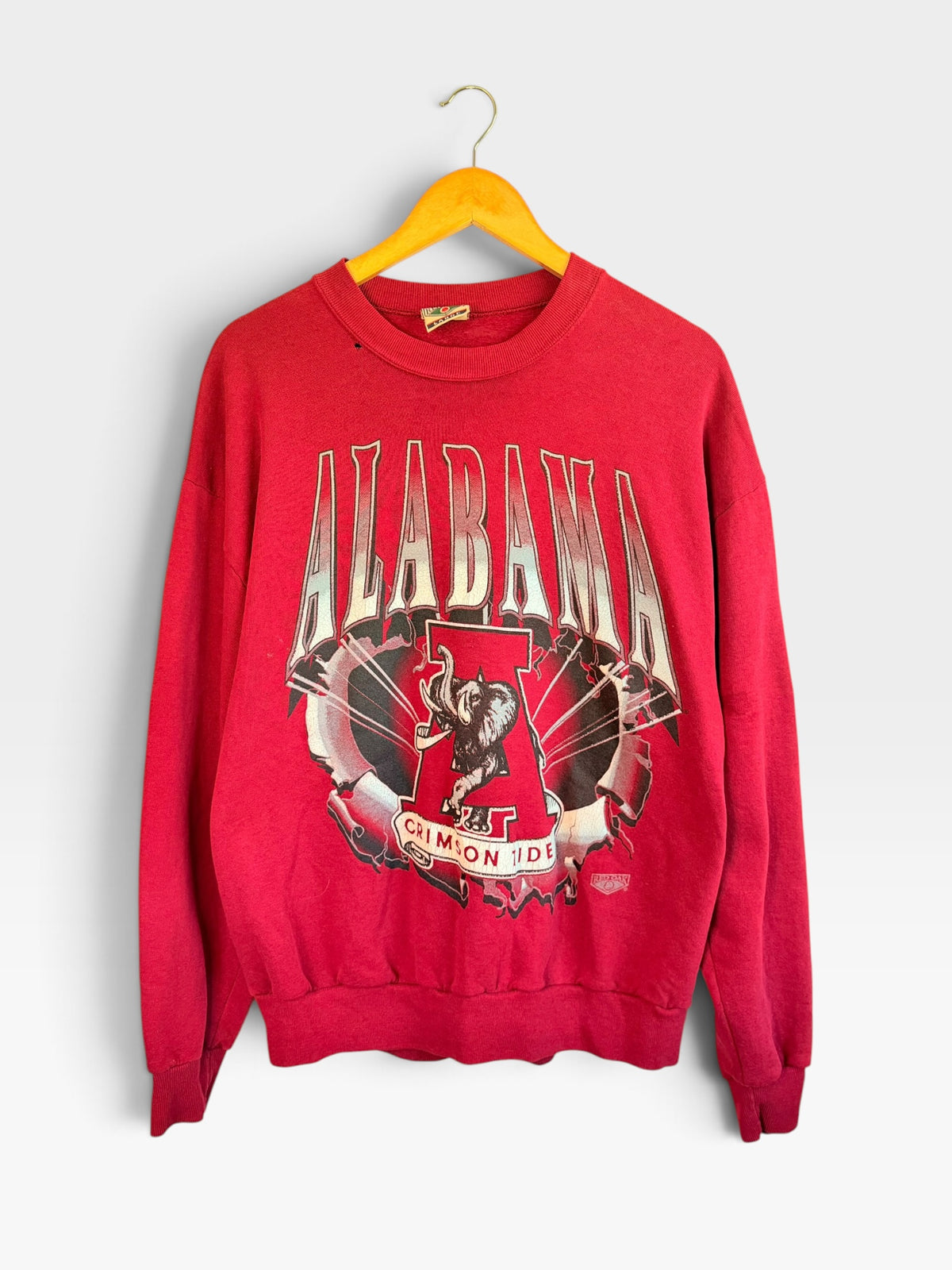 225 Threadz vintage red Alabama Crimson Tide crewneck sweatshirt with retro elephant mascot graphic on a hanger