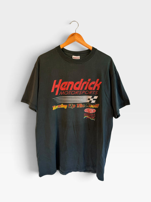 225 Threadz vintage black Hendrick Motorsports racing t-shirt with Turning Up The Heat graphic on a wooden hanger