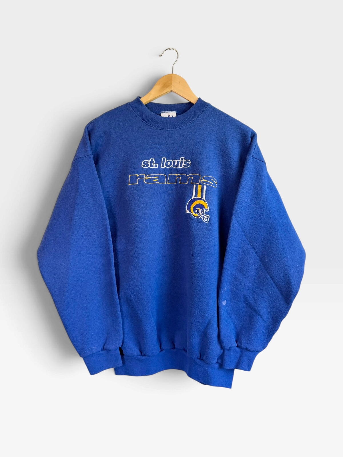 225 Threadz vintage blue St. Louis Rams crewneck sweatshirt with embroidered team logo and helmet on chest