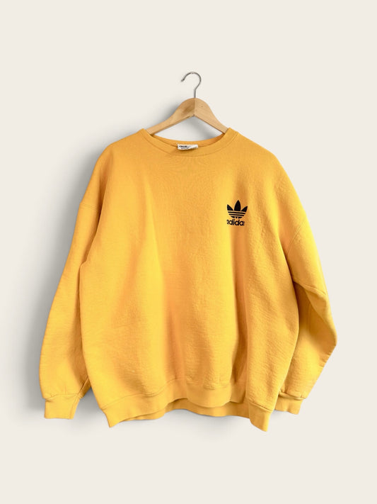 225 Threadz vintage yellow Adidas crewneck sweatshirt with black embroidered Trefoil logo on a wooden hanger