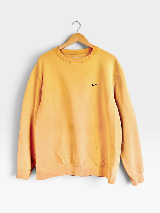 225 Threadz sun-washed yellow Nike crewneck sweatshirt with black embroidered Swoosh logo on a wooden hanger